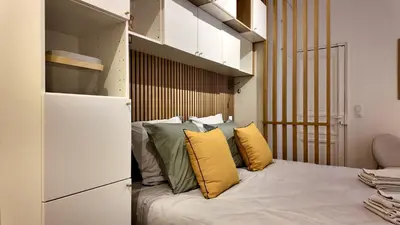 Un ou plusieurs lits dans un hébergement de l'établissement Appartement 2 personnes proche Tour Eiffel