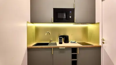 Cuisine ou kitchenette dans l'établissement Appartement 2 personnes proche Tour Eiffel