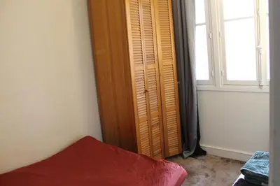 Un ou plusieurs lits dans un hébergement de l'établissement Pleasant Apartment South Paris