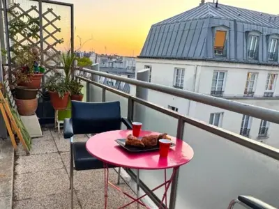 Balcon ou terrasse dans l'établissement Grand studio vue sur la Tour Eiffel