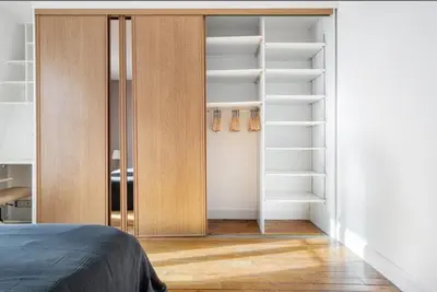 Un ou plusieurs lits dans un hébergement de l'établissement Magnifique appartement avec vue sur la Tour Eiffel