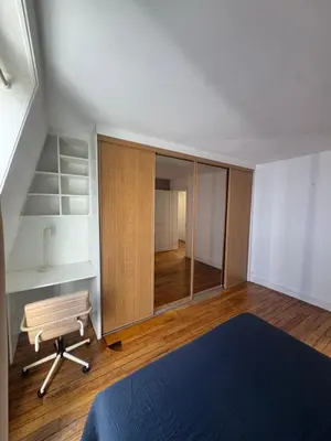 Un ou plusieurs lits dans un hébergement de l'établissement Magnifique appartement avec vue sur la Tour Eiffel