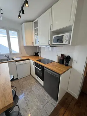 Cuisine ou kitchenette dans l'établissement Magnifique appartement avec vue sur la Tour Eiffel