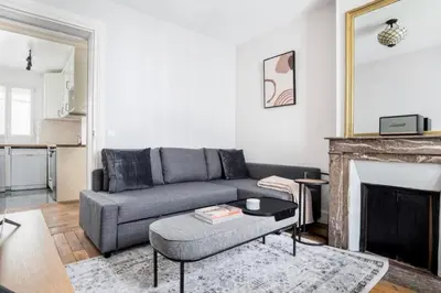 Coin salon dans l'établissement Magnifique appartement avec vue sur la Tour Eiffel