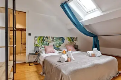 Un ou plusieurs lits dans un hébergement de l'établissement TheBlueStay 126 - Charming apartment - Paris 17
