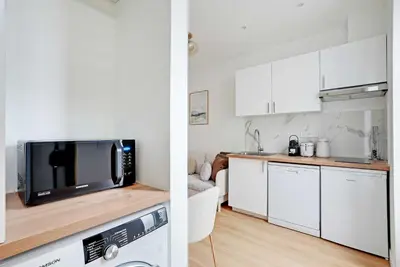 Cuisine ou kitchenette dans l'établissement Cozy Apartment 1BR-3P - Ivry