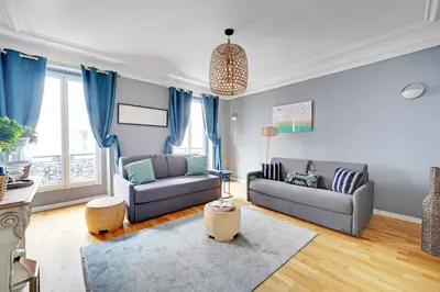 Coin salon dans l'établissement Comfortable Apartment 1BR-4P - Champs Elysees