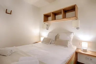 Un ou plusieurs lits dans un hébergement de l'établissement Marais, Seine 1BR AC by Melvane