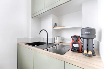 Cuisine ou kitchenette dans l'établissement Sublime appartement Mogador