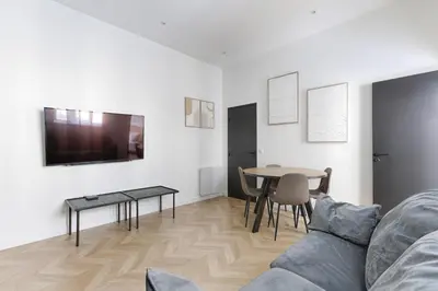 Télévision ou salle de divertissement dans l'établissement Sublime appartement Mogador