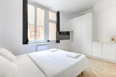 Un ou plusieurs lits dans un hébergement de l'établissement Sublime appartement Mogador