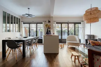 Coin salon dans l'établissement Veeve - Family House near Roland Garros