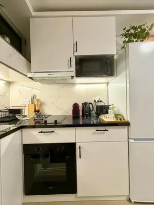 Cuisine ou kitchenette dans l'établissement Stylish Apartment in Paris Center Metro 6 Glacière & M7 Les Gobelins