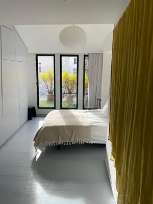 Un ou plusieurs lits dans un hébergement de l'établissement Loft Sainte Claude