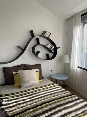 Un ou plusieurs lits dans un hébergement de l'établissement Loft Sainte Claude