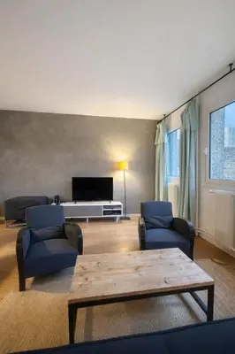 Coin salon dans l'établissement Appartement chic près du Champ-de-Mars