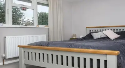 Un ou plusieurs lits dans un hébergement de l'établissement RueJuge Appartement LuxeApt parking