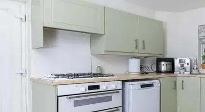 Cuisine ou kitchenette dans l'établissement RueJuge Appartement LuxeApt parking