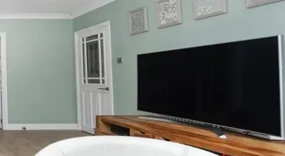 Télévision ou salle de divertissement dans l'établissement RueJuge Appartement LuxeApt parking