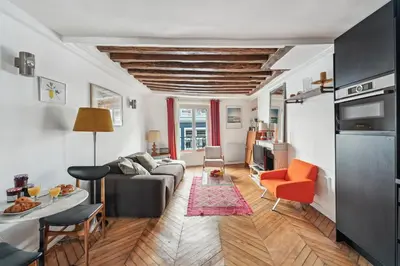 Coin salon dans l'établissement BnBNova - 1BR - Opéra & Palais Royal Gardens