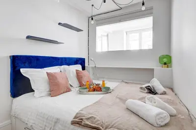 Un ou plusieurs lits dans un hébergement de l'établissement TheBlueStay 100 - Cozy Apartment - Le Marais
