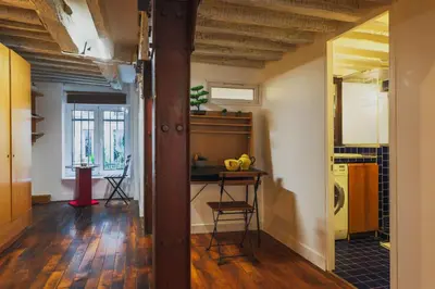 Cuisine ou kitchenette dans l'établissement Characterful Apartment 6P Grand Boulevard