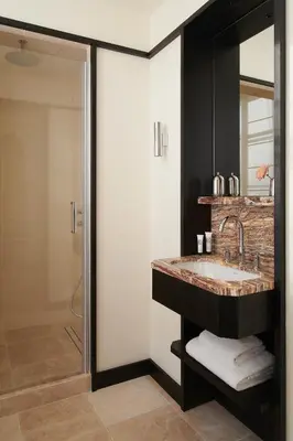 Salle de bains dans l'établissement Hôtel Atlas
