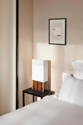 Un ou plusieurs lits dans un hébergement de l'établissement Hôtel Atlas