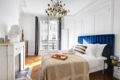 Un ou plusieurs lits dans un hébergement de l'établissement Serenty - 2BR - Le Louvre & Saint Germain