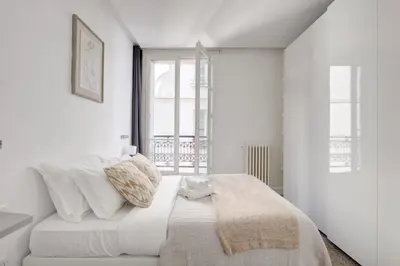Un ou plusieurs lits dans un hébergement de l'établissement Serenty - 2BR - Le Louvre & Saint Germain