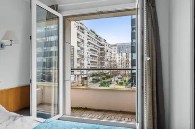 Un ou plusieurs lits dans un hébergement de l'établissement Appartement T2, Proche Parc Expo, Parking Inclus