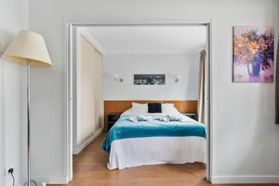 Un ou plusieurs lits dans un hébergement de l'établissement Appartement T2, Proche Parc Expo, Parking Inclus