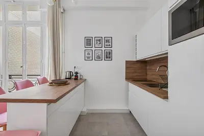 Cuisine ou kitchenette dans l'établissement Design apartment Avenue des Champs Elysées