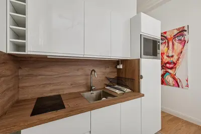 Cuisine ou kitchenette dans l'établissement Design apartment Avenue des Champs Elysées