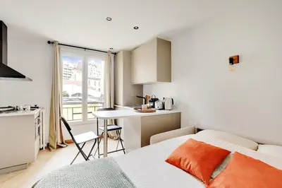 Un ou plusieurs lits dans un hébergement de l'établissement Studio Paris 36 2 people Eiffel Tower