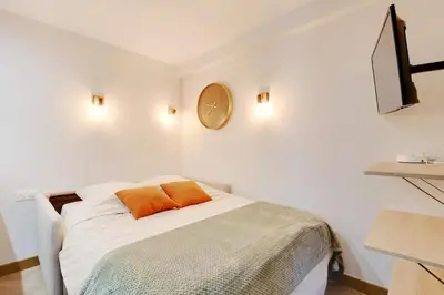 Un ou plusieurs lits dans un hébergement de l'établissement Studio Paris 36 2 people Eiffel Tower