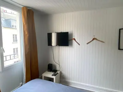 Télévision ou salle de divertissement dans l'établissement Beautifull small flat