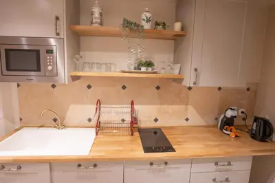 Cuisine ou kitchenette dans l'établissement Appartement Atypique Parc Montsouris - Paris 14