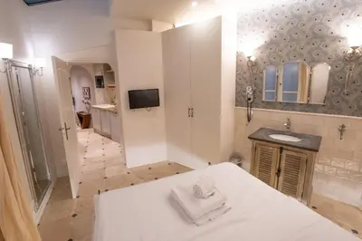 Un ou plusieurs lits dans un hébergement de l'établissement Appartement Atypique Parc Montsouris - Paris 14