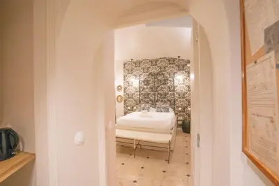 Un ou plusieurs lits dans un hébergement de l'établissement Appartement Atypique Parc Montsouris - Paris 14