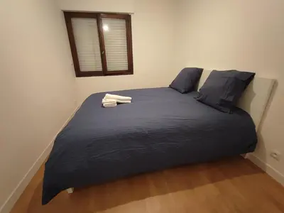 Un ou plusieurs lits dans un hébergement de l'établissement Charming Bagneux Nest