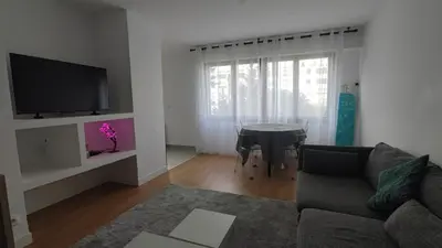 Télévision ou salle de divertissement dans l'établissement Charming Bagneux Nest