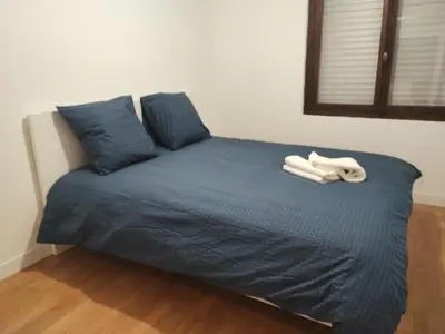 Un ou plusieurs lits dans un hébergement de l'établissement Charming Bagneux Nest