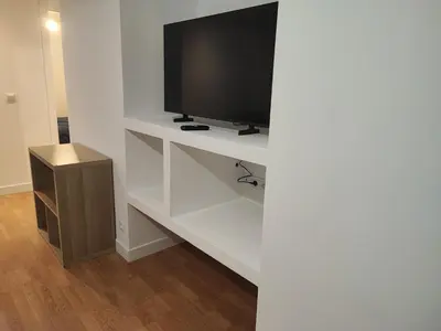 Télévision ou salle de divertissement dans l'établissement Charming Bagneux Nest
