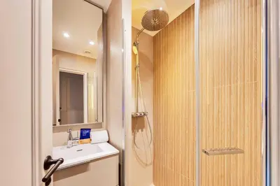 Salle de bains dans l'établissement Charming apartment a c 2BR-6P Grand boulevards