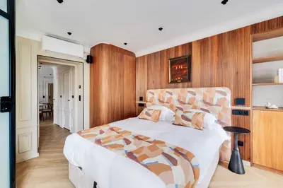 Un ou plusieurs lits dans un hébergement de l'établissement Charming apartment a c 2BR-6P Grand boulevards