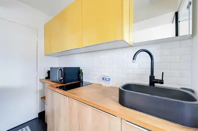 Cuisine ou kitchenette dans l'établissement Studio-Eiffel Tower view - Moulin Rouge Montmartre