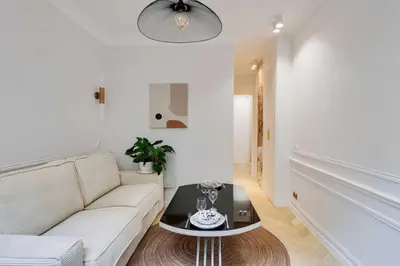 Coin salon dans l'établissement Charming apartment - 1BR 4P - Center of Paris