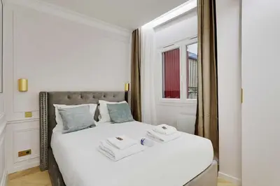 Un ou plusieurs lits dans un hébergement de l'établissement Charming apartment - 1BR 4P - Center of Paris