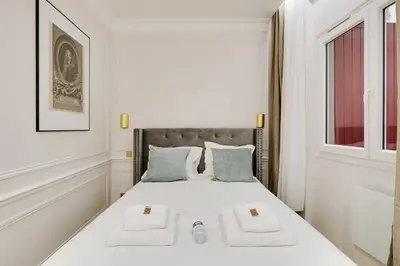 Un ou plusieurs lits dans un hébergement de l'établissement Charming apartment - 1BR 4P - Center of Paris